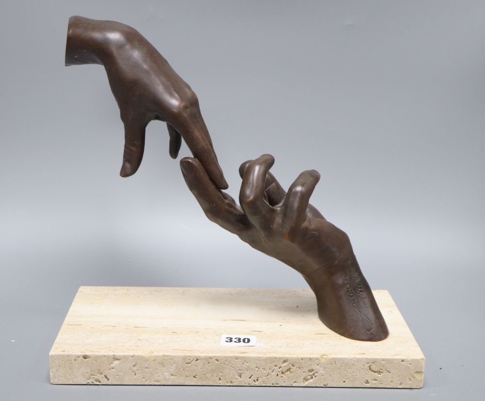 A modern American limited edition bronzed hand sculpture on a hardstone base, signed Lorenzo